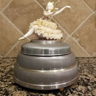 Vntg Aluminum Powder Puff Music Box With Dresden Porcelain Doll And Glass Insert