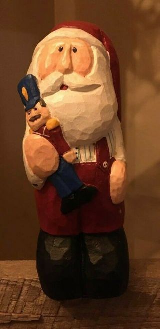Eddie Walker Midwest Of Cannon Falls Santa Holding Soldier Figurine