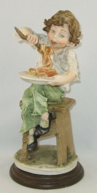Vintage Giuseppe Armani Children Figurine " Boy Eating Spaghetti "