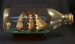 Vintage Nautical Sailboat Tall Ship In The Bottle Length 7 1/2 " With Wood Stand