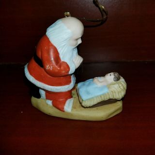 The Kneeling Santa W/ Baby Jesus Christmas Ornament Porcelain Roman Inc.  1985