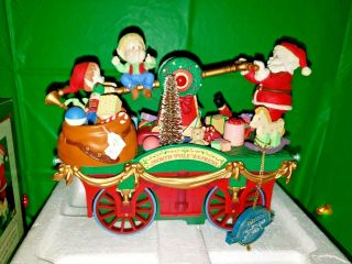 Enesco Animated Keeping Santa On Track.  Small World Of Musicals