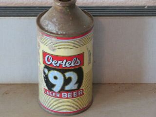 Oertels 92.  Lager.  Beer.  Solid.  Colorful.  Cone Top