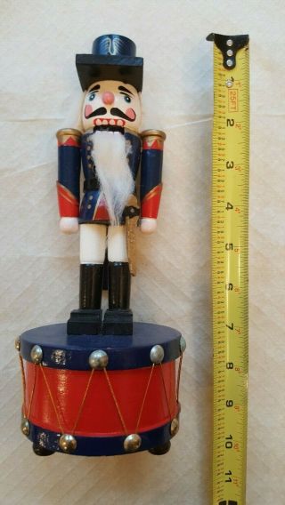 Musical Nutcracker 10 Inch Standing On A Drum.