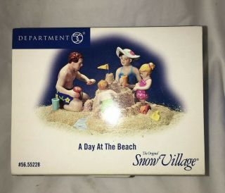 Dept 56 Snow Village A Day At The Beach 56.  55228 Family Making Sand Castle