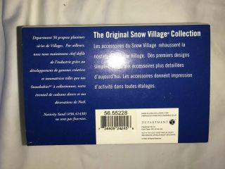 Dept 56 Snow Village A Day At The Beach 56.  55228 Family Making Sand Castle 2