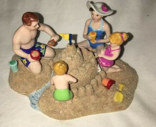 Dept 56 Snow Village A Day At The Beach 56.  55228 Family Making Sand Castle 3