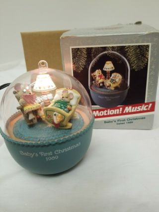 Hallmark Keepsake Magic Ornament 1989 Baby’s First Christmas Light Motion Music