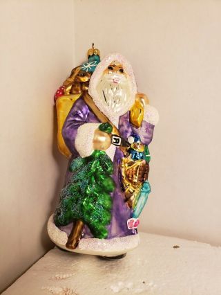 Christopher Radko Santa Holding A Christmas Tree In A Lavender Suit