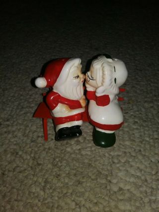 Vintage Santa And Mrs Claus Kissing On Bench Salt And Pepper Shakers