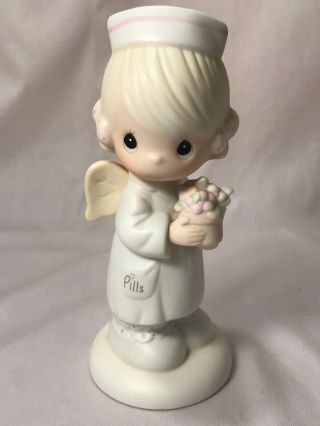 1986 Precious Moments " Angel Of Mercy " Nurse Porcelain Figurine 102482 Thailand