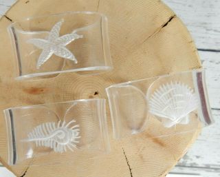 Set Of 7 Vintage Lucite Acrylic Etched Sea Shell Napkin Rings Beach Theme
