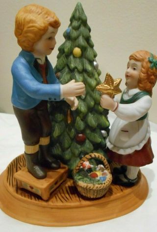 Christmas Memories Statue Avon Collectible " Keeping The Christmas Tradition "