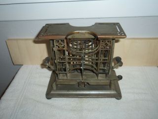 Vintage 1914 Universal - Landers Frary Clark " Swing Arm Coil Toaster "