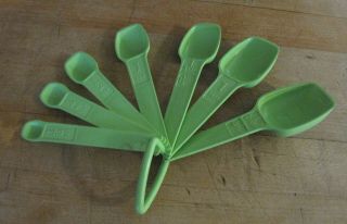 Set Of Seven Lime Green Tupperware Nesting Measuring Spoons With Ring