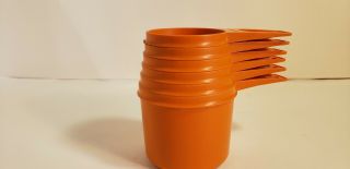 Vintage Tupperware Orange 6 Piece Measuring Cup Set