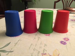 Four (4) Colorful Tupperware Kids 