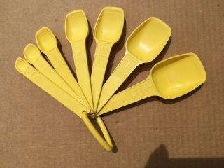 8 Piece Tupperware Nesting Measuring Spoons With Snap Ring,  Yellow,  1272