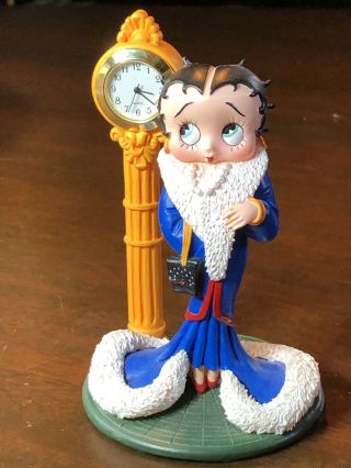 Betty Boop All Dressed Up And Waiting By A Clock For Her Date
