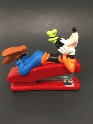 Goofy Laying Down On Top Of Red Stapler Walt Disney Mickey Mouse And Friends