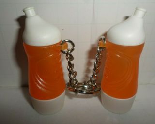 2 Tupperware Orange & White Sports Bottle Key Chains
