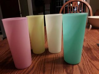 Four Vintage Tupperware Tumblers 6 1/2 " Tall Sheer Colors Good
