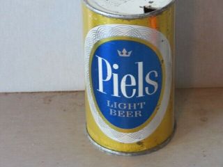 Piels Light Beer.  Real Beauty Inside.  Flat Top