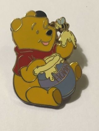 Disney Winnie The Pooh Sitting With A Jar Pot Of Hunny Honey And Bee Pin 2005