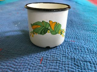 Three Inch Tall Vintage White Enamel Cup With Interesting Leaf Design