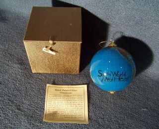 Li Bien - Reverse Hand Painted Glass Ornament - " So The World May Hear "