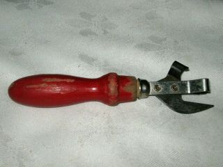 A Vintage English Squire & Sons Red Enamel Painted Wood Handle Can Opener