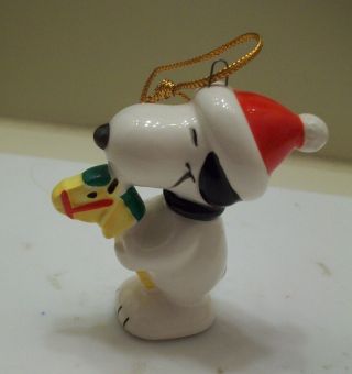 2.  5 " Snoopy With Santa Cap & Riding A Toy Horse Ceramic Ornament,  Made In Japan