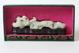 Chinese Carved Celadon Jade Brush Rest On A Wood Stand,  China