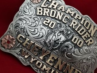 2000 RODEO TROPHY BELT BUCKLE CHEYENNE WYOMING CHAMPION BRONC RIDER VINTAGE 603 2