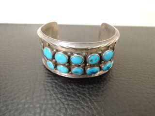 Opulent Sterling Silver Navajo Handmade Cuff Bracelet With 10 Turquoise Stones