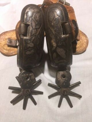 1800s forged mexican spurs,  silver engraved,  with modern replacement strap 2