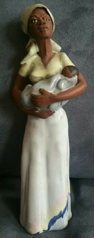 VINTAGE AFRICAN AMERICAN WOMAN CARRYING BABY 9.  5 
