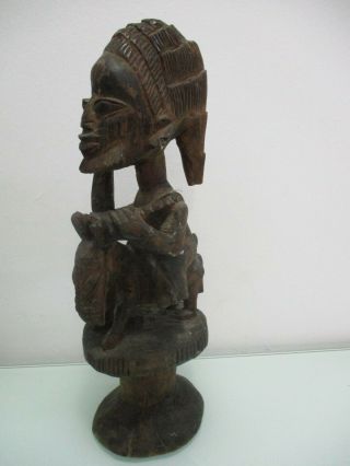 African Art: A Wooden Carved Statue: A Native On A Donkey,  Ghana,  60 