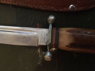 Pre 1964 Puma fixed blade hunting knife.  4.  5 inch blade with sheath 3