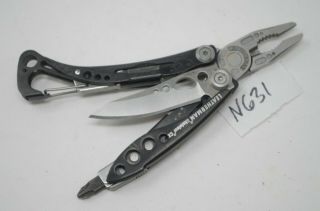 Leatherman Skeletool Cx Multi - Tool Pocket Knife Pliers Folding Blade Minimalist